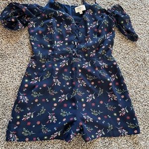 Navy floral lace up front romper Sz M